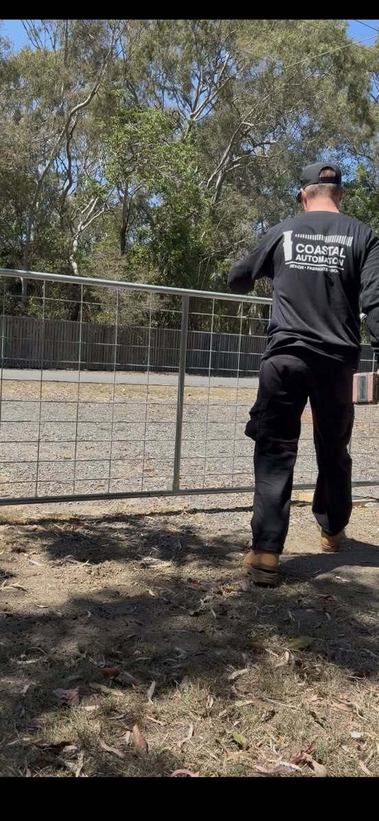 Coastal Automation craftsman on site - professional gate installation